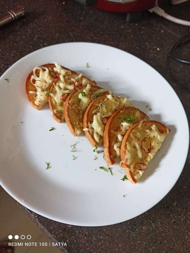 Delicious Garlic Bread with Cheese prepared by COOX