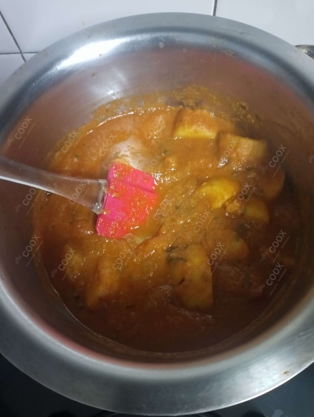 Delicious Dum Aloo prepared by COOX