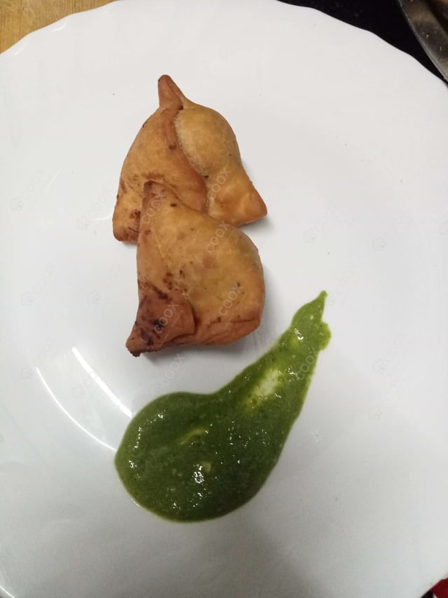 Delicious Mini Samosas prepared by COOX