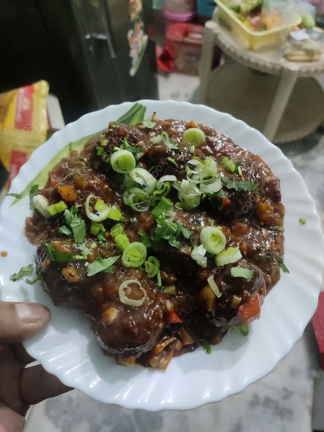 Delicious Veg Manchurian (Dry) prepared by COOX