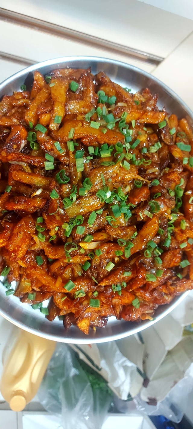 Delicious Honey Chilli Potato prepared by COOX