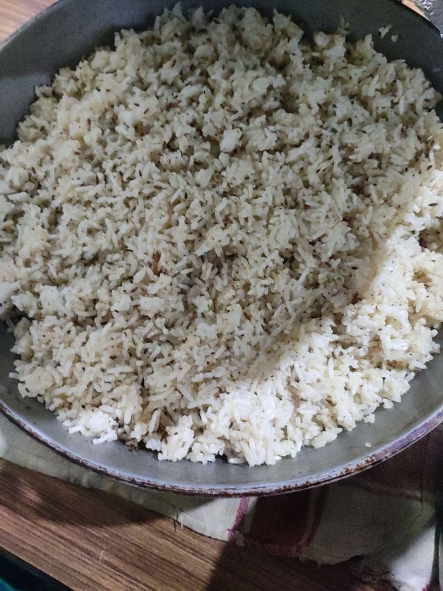 Delicious Jeera Rice prepared by COOX