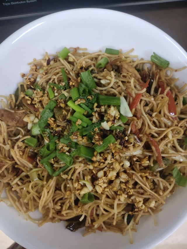 Delicious Chilli Garlic Noodles prepared by COOX