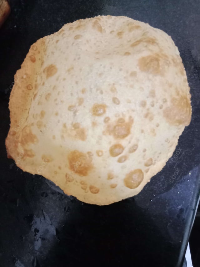 Delicious Bhature prepared by COOX