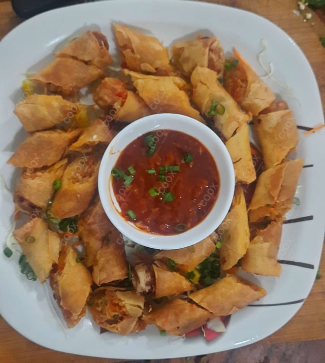 Delicious Veg Spring Rolls prepared by COOX