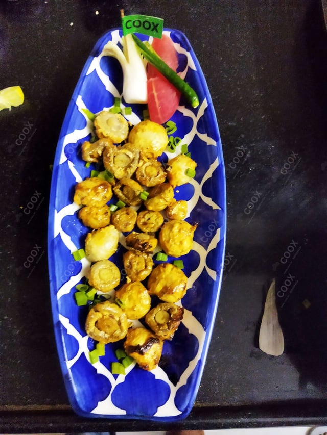 Delicious Mushroom Tikka prepared by COOX