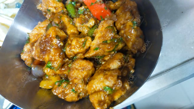 Delicious Chilli  Chicken prepared by COOX