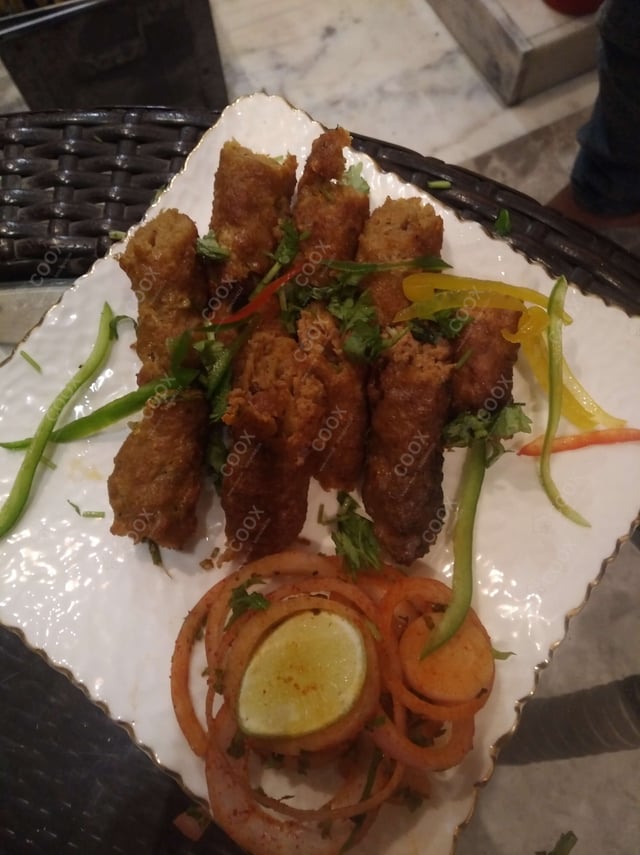 Delicious Mutton Seekh Kebab prepared by COOX