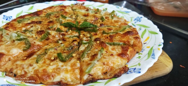 Delicious Veg Pizza prepared by COOX