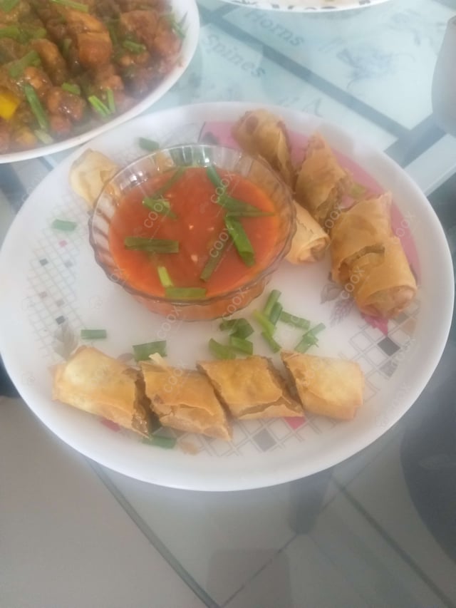 Delicious Veg Spring Rolls prepared by COOX