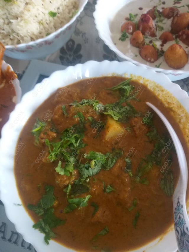 Delicious Dum Aloo prepared by COOX