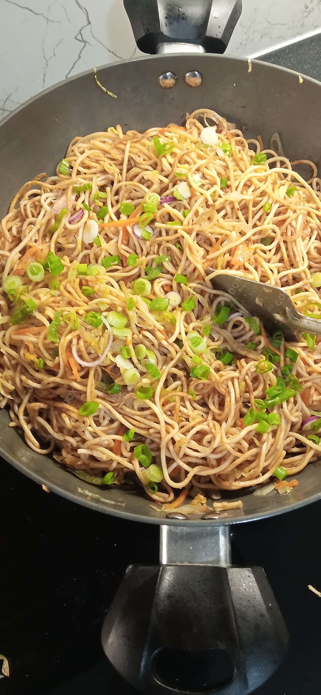 Delicious Veg Hakka Noodles prepared by COOX