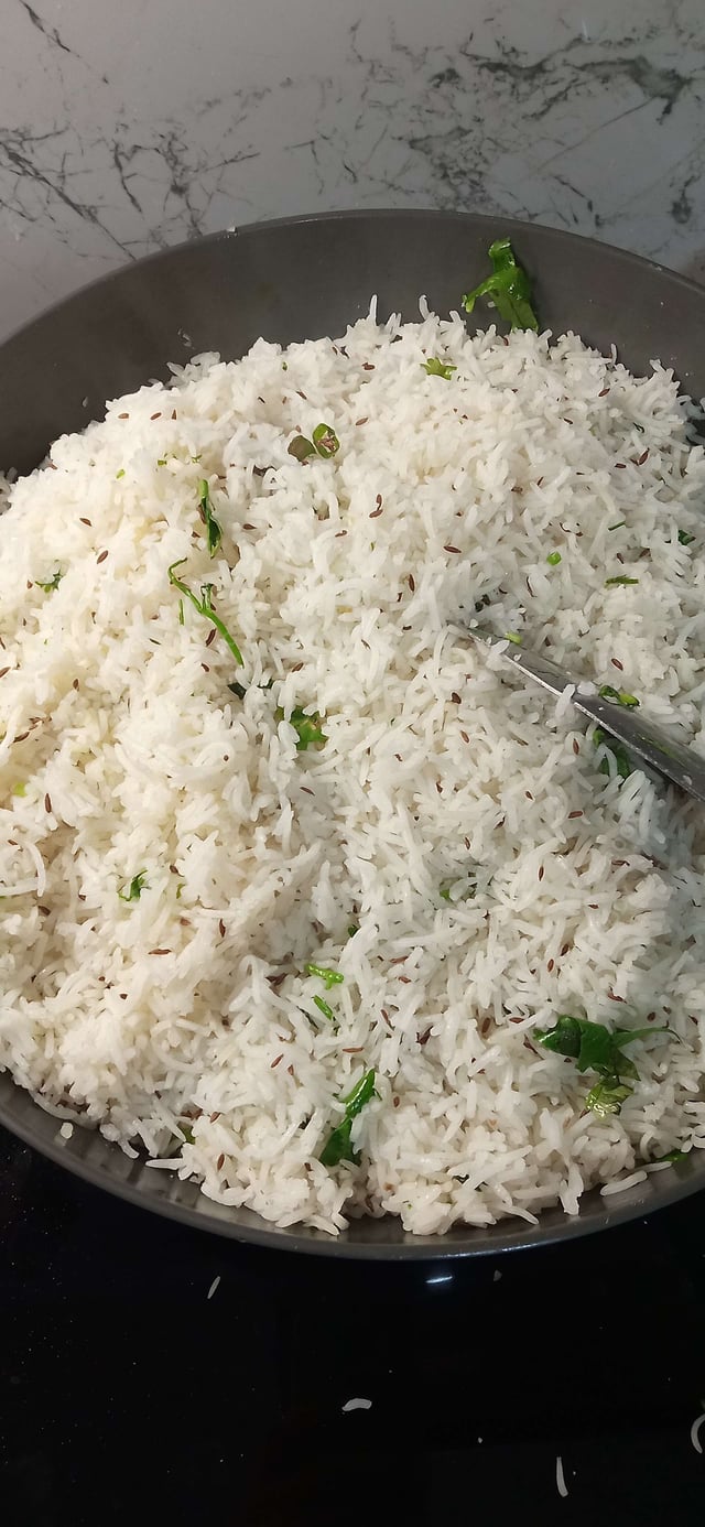 Delicious Jeera Rice prepared by COOX