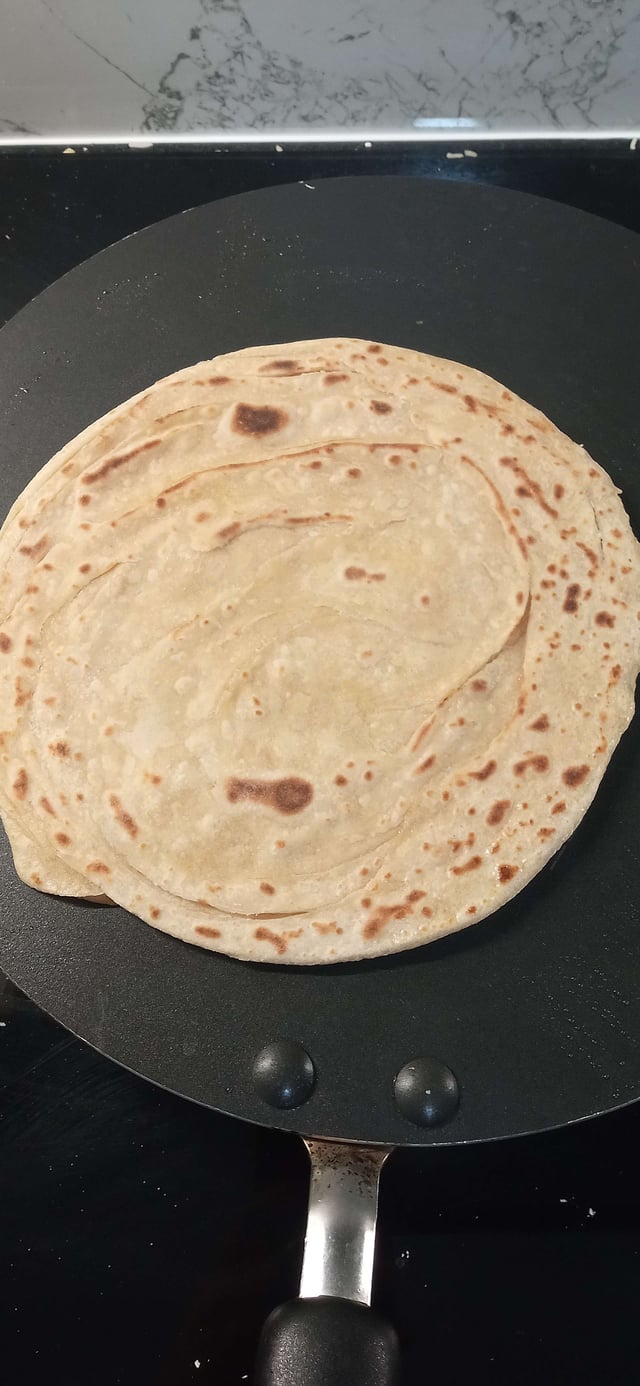 Delicious Lachha Parathas prepared by COOX