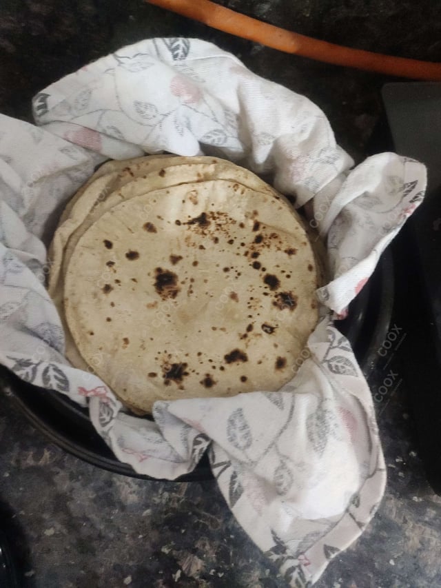 Delicious Tawa Rotis prepared by COOX