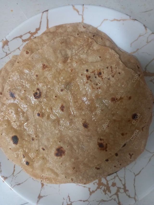 Delicious Tawa Rotis prepared by COOX