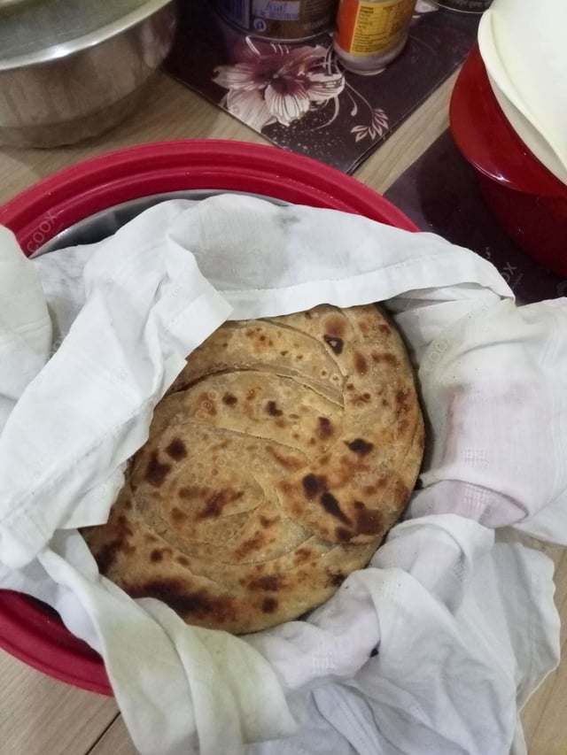 Delicious Lachha Parathas prepared by COOX