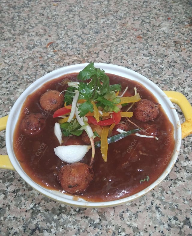 Delicious Veg Manchurian (Gravy) prepared by COOX