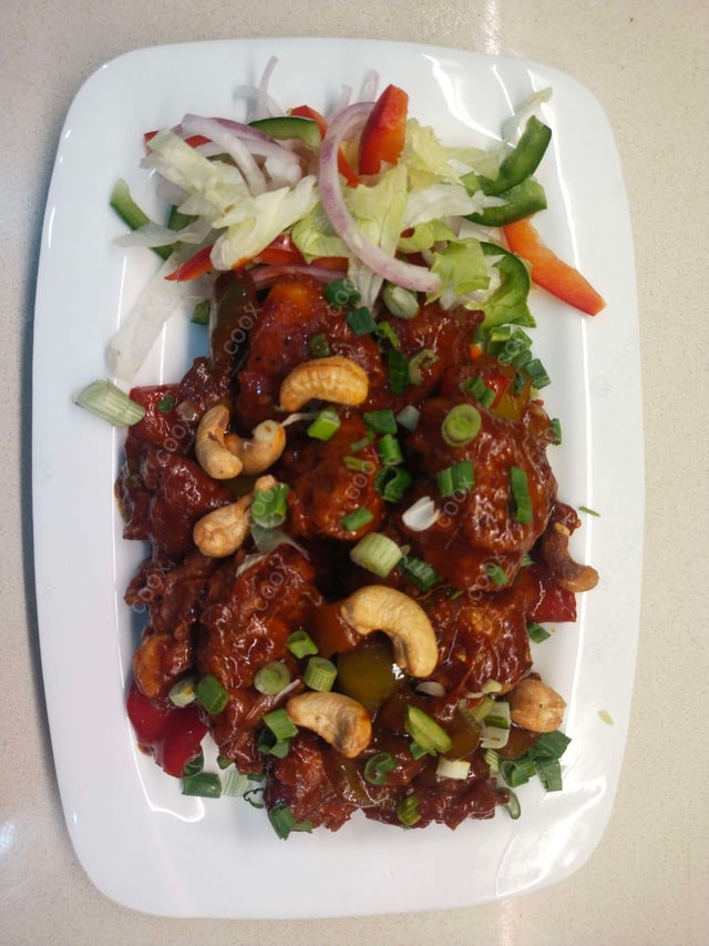 Delicious Kung Pao Chicken prepared by COOX