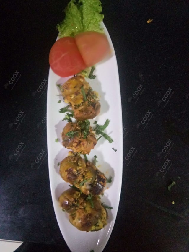 Delicious Mushroom Tikka prepared by COOX