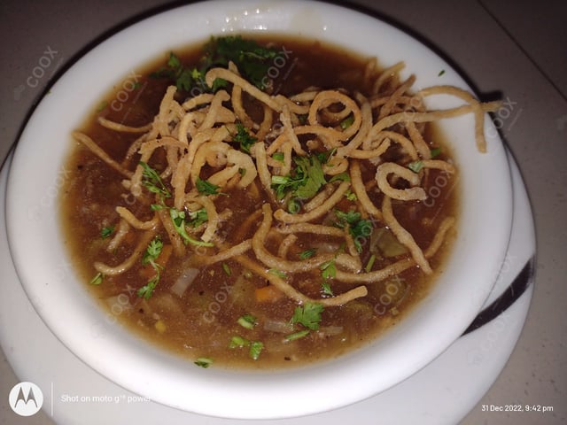 Delicious Vegetable Manchow Soup prepared by COOX