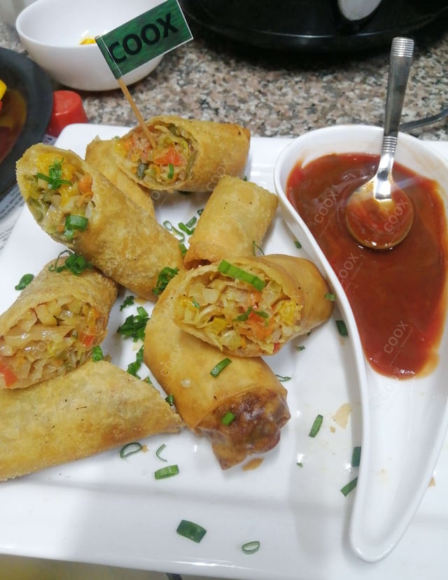 Delicious Veg Spring Rolls prepared by COOX