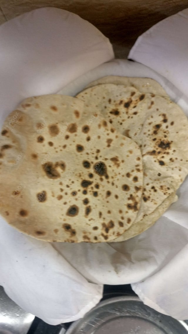 Delicious Tawa Rotis prepared by COOX