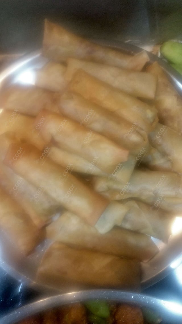 Delicious Veg Spring Rolls prepared by COOX