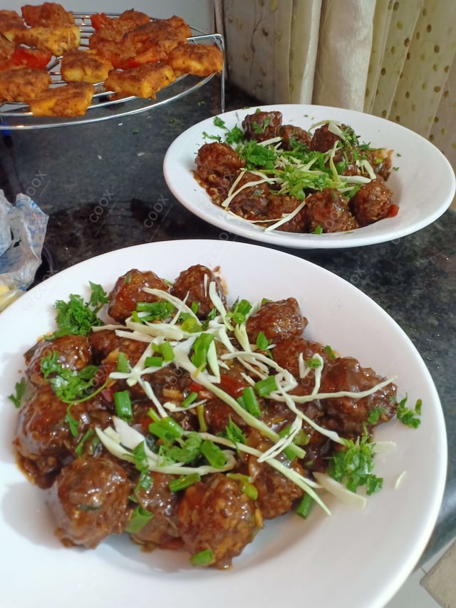 Delicious Veg Manchurian (Dry) prepared by COOX