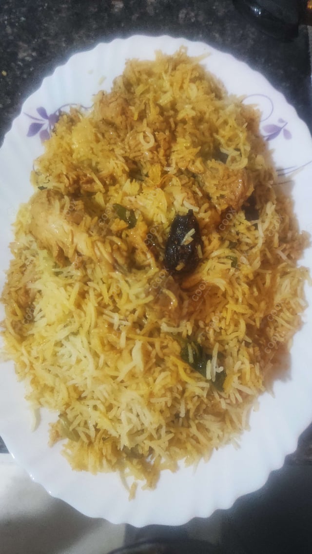 Delicious Chicken Biryani prepared by COOX