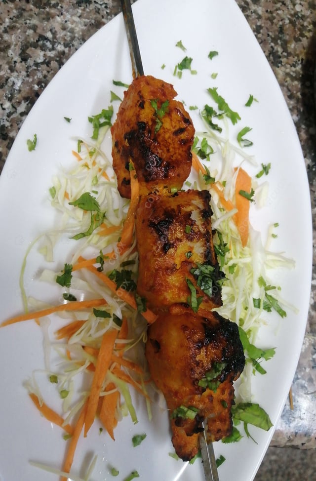 Delicious Fish Tikka prepared by COOX