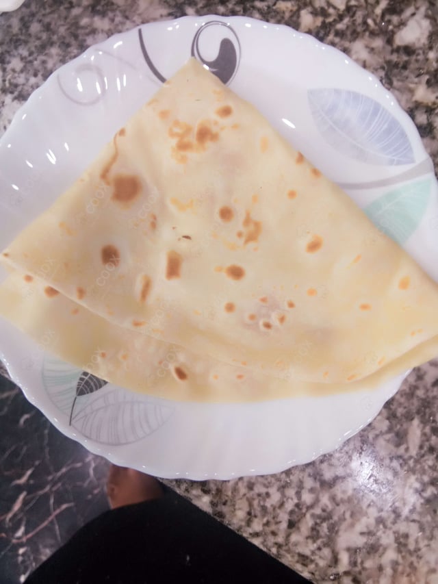 Delicious Butter Naan prepared by COOX