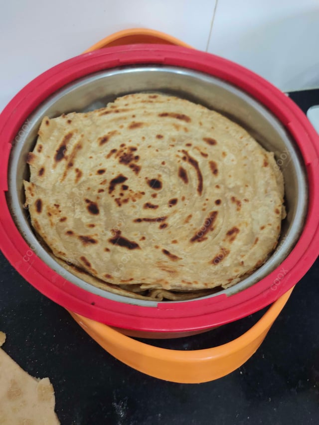 Delicious Lachha Parathas prepared by COOX