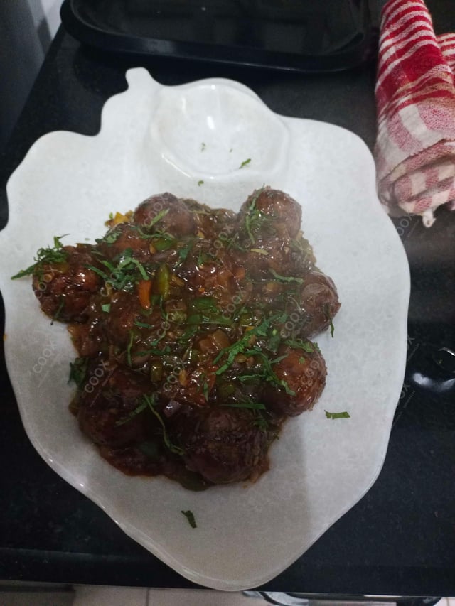 Delicious Veg Manchurian (Dry) prepared by COOX