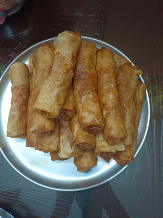 Delicious Veg Spring Rolls prepared by COOX