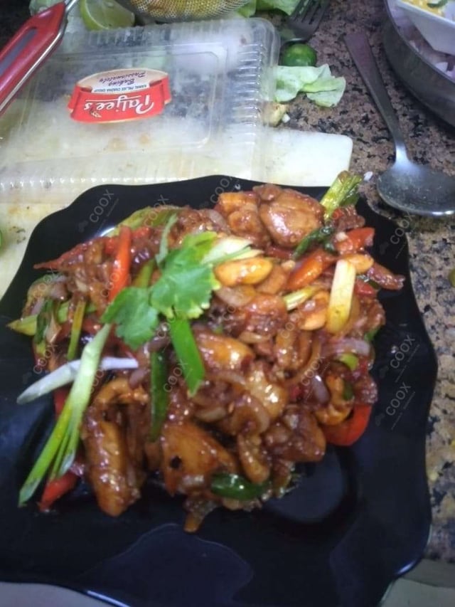 Delicious Kung Pao Chicken prepared by COOX