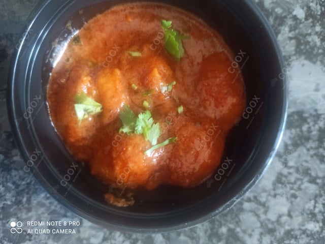 Delicious Dum Aloo prepared by COOX