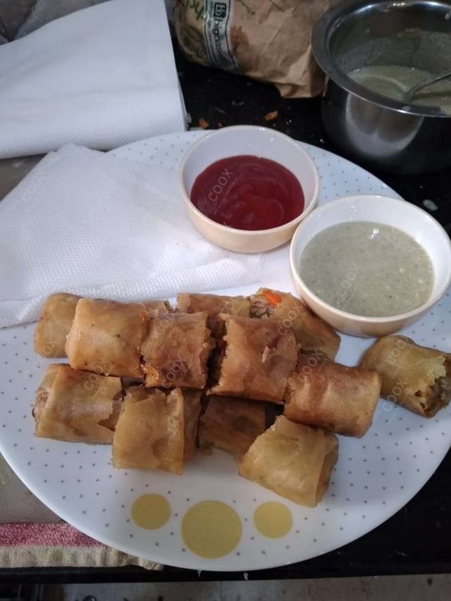 Delicious Veg Spring Rolls prepared by COOX