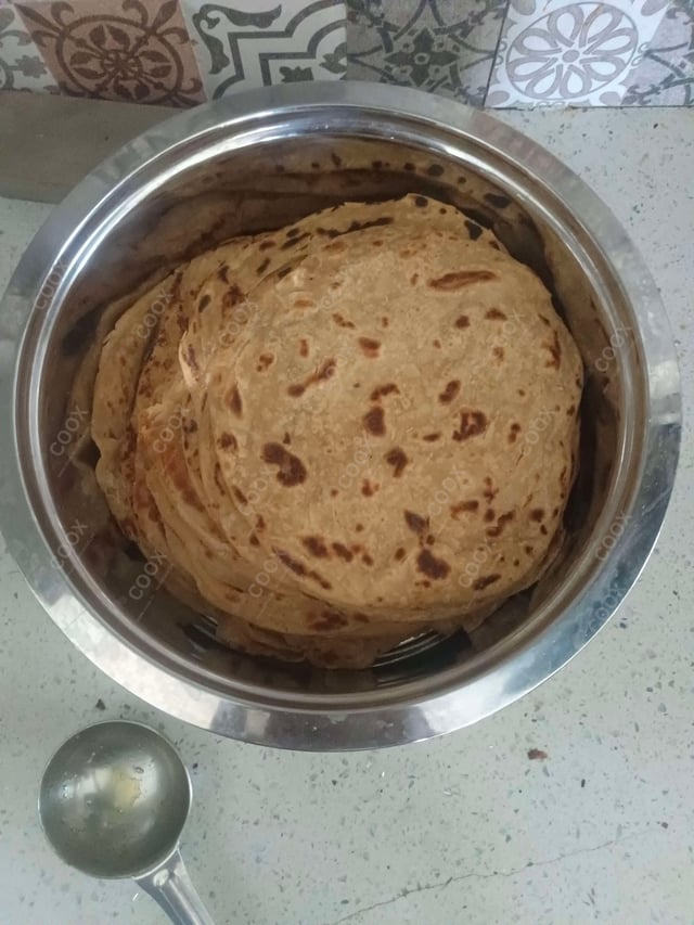 Delicious Lachha Parathas prepared by COOX