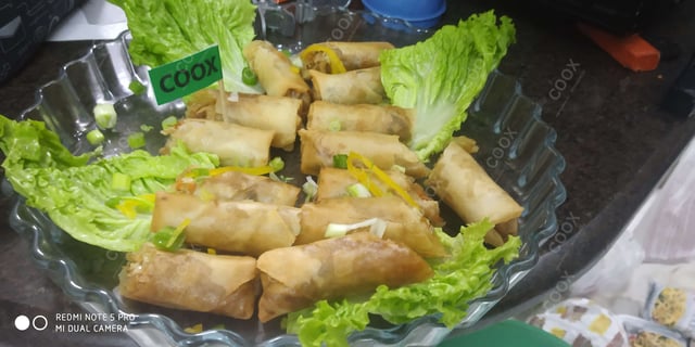 Delicious Veg Spring Rolls prepared by COOX