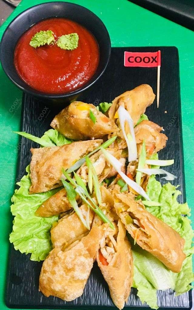 Delicious Chicken Spring Rolls prepared by COOX