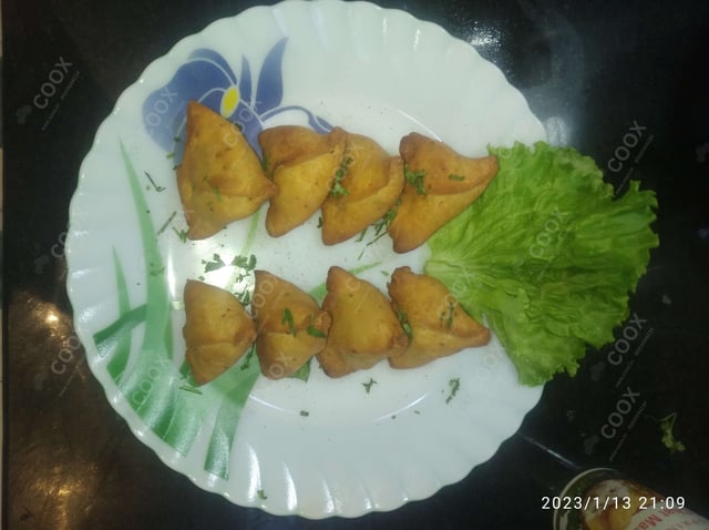 Delicious Mini Samosas prepared by COOX