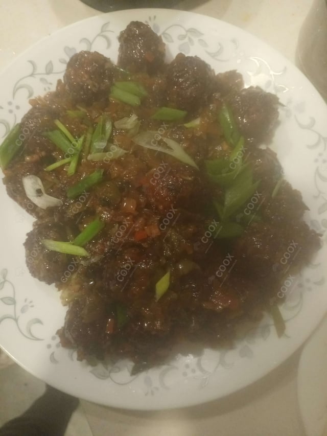 Delicious Veg Manchurian (Dry) prepared by COOX