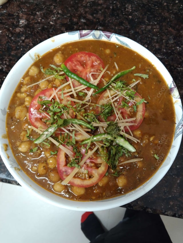 Delicious Chole Masala prepared by COOX