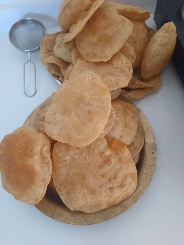 Delicious Poori Bhaji prepared by COOX