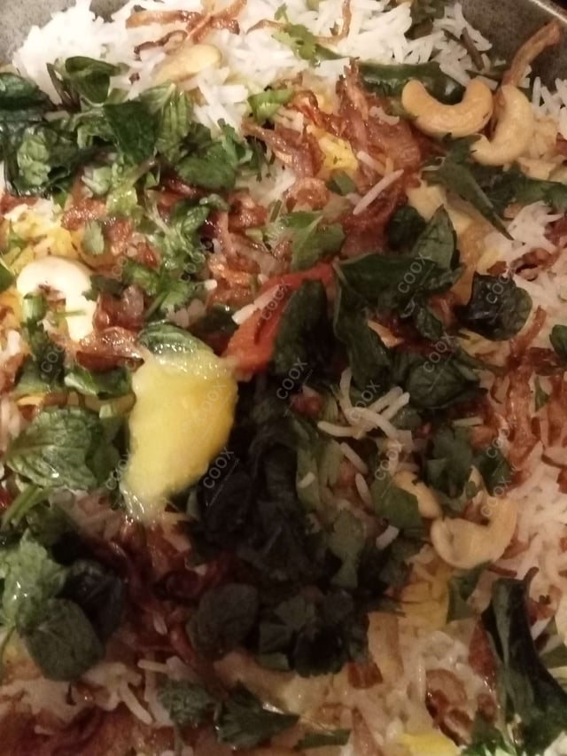 Delicious Veg Biryani prepared by COOX