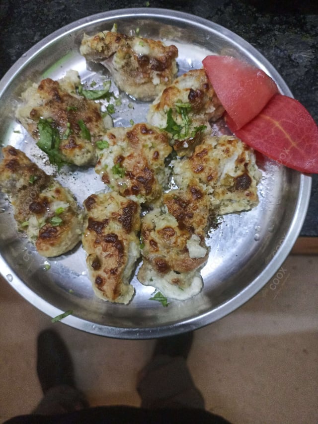 Delicious Murgh Malai Tikka prepared by COOX