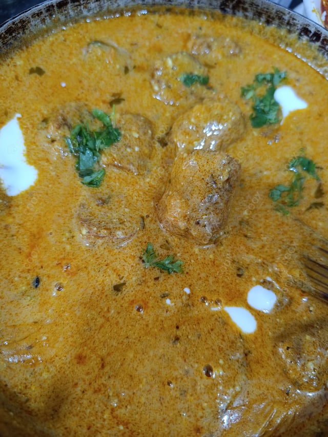 Delicious Gatte ki Sabzi prepared by COOX