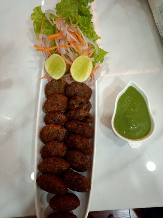 Delicious Hariyali Kebab prepared by COOX