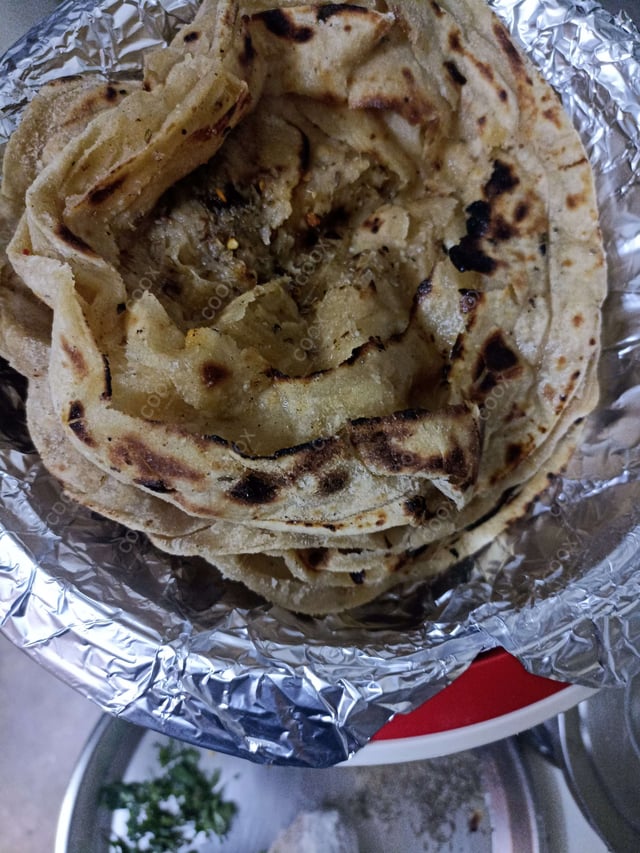 Delicious Lachha Parathas prepared by COOX